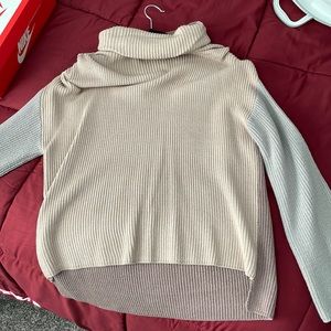 Cowl neck with grey sleeves, brown back and light tan front.
